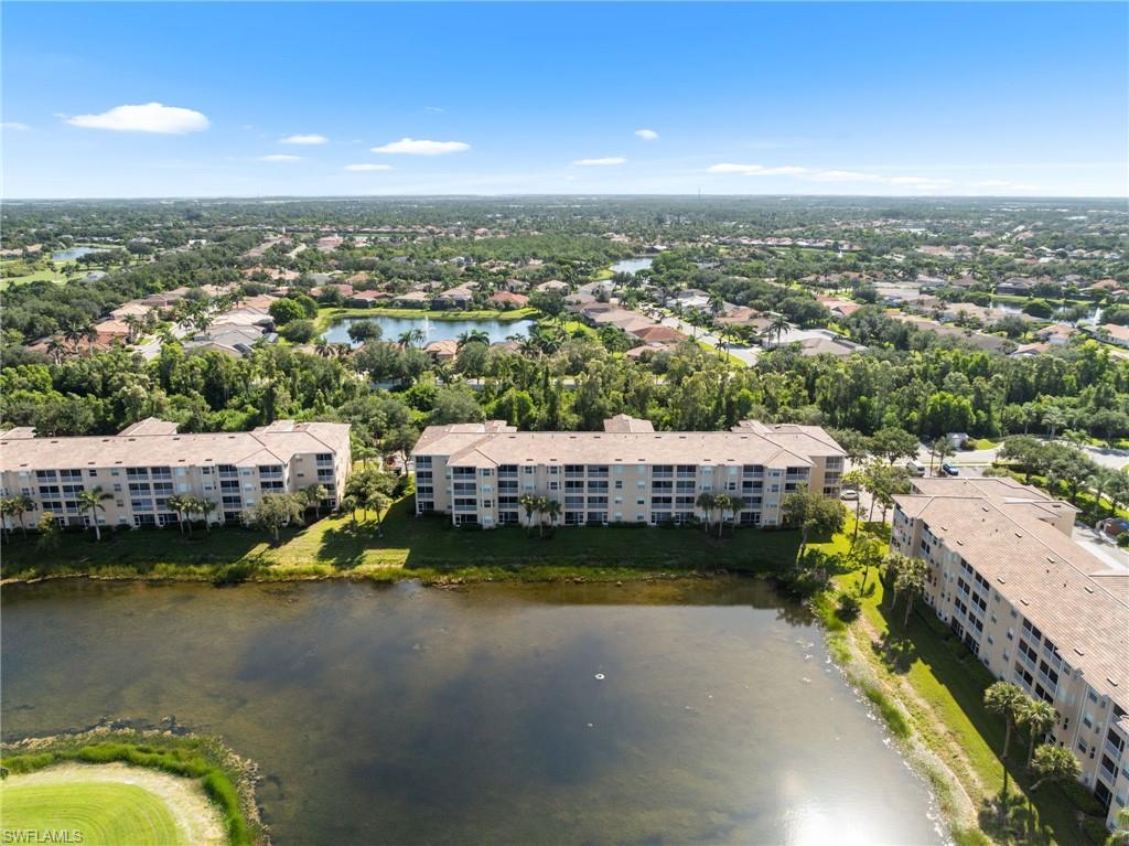 8570 Kingbird Loop, Unit 547 Estero, FL 33967 - Photo 36 of 50 a view of a city with lawn chairs