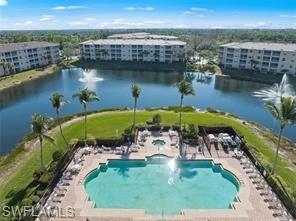 8570 Kingbird Loop, Unit 547 Estero, FL 33967 - Photo 39 of 50 an aerial view of a house with a lake view