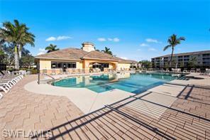 8570 Kingbird Loop, Unit 547 Estero, FL 33967 - Photo 41 of 50 a view of a house with a yard