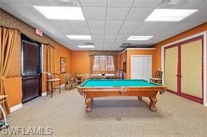 8570 Kingbird Loop, Unit 547 Estero, FL 33967 - Photo 47 of 50 a room with pool table and windows