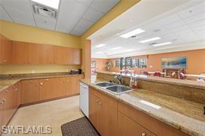 8570 Kingbird Loop, Unit 547 Estero, FL 33967 - Photo 50 of 50 a kitchen with sink and cabinets