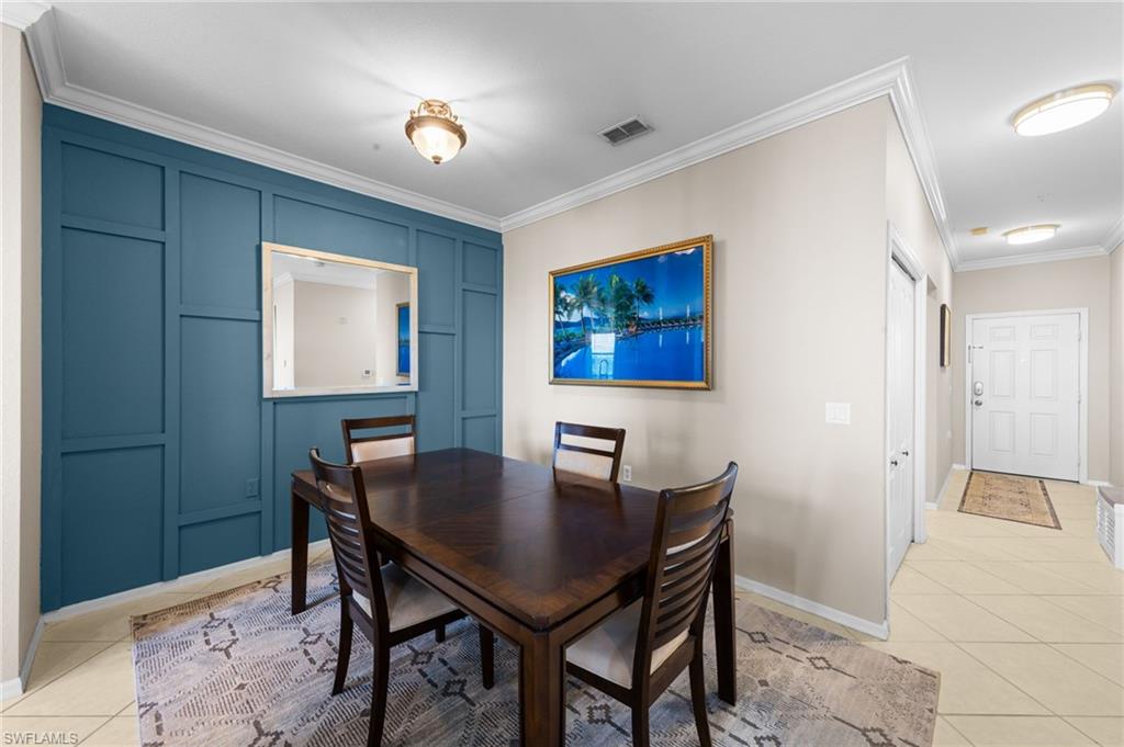 8570 Kingbird Loop, Unit 547 Estero, FL 33967 - Photo 9 of 50 a view of a dining room with furniture