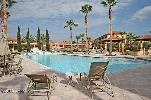 9745 Touchton Road, Unit 927 Jacksonville, FL 32246 - Photo 18 of 22 a lake view with a sitting space and seating space