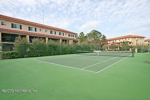 9745 Touchton Road, Unit 927 Jacksonville, FL 32246 - Photo 21 of 22 a view of a tennis court