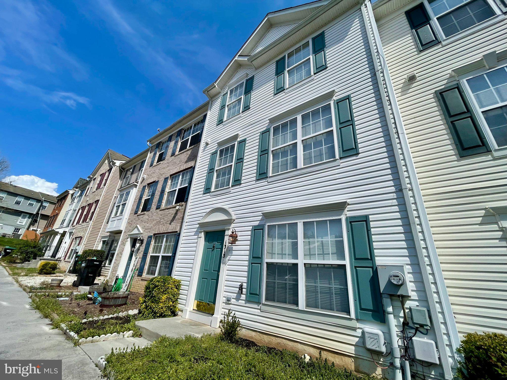 1313 Pendleton Lane Strasburg, VA 22657 - Photo 2 of 22 Charming townhomes under blue skies.