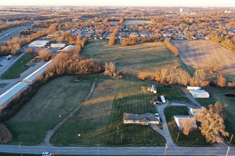 1723 6 Points Road Bloomington, IL 61701 - Photo 2 of 9 an aerial view of residential houses with outdoor space and river