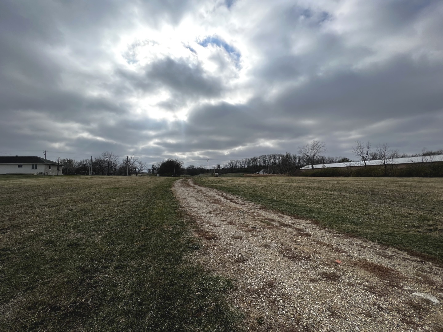 1723 6 Points Road Bloomington, IL 61701 - Photo 9 of 9 a view of a lake from a yard