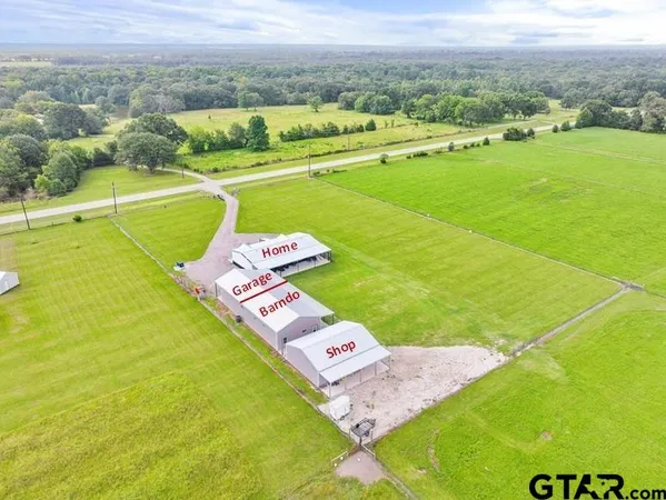 a kitchen with cabinets and window