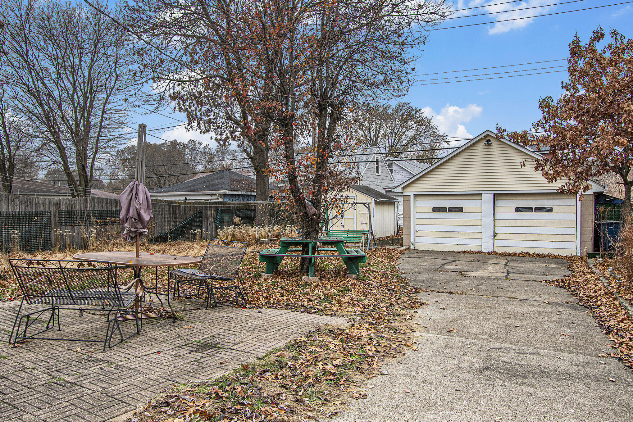 1027 Spruce Street Hammond, IN 46324 - Photo 17 of 17 a front view of a house with garden and sitting area