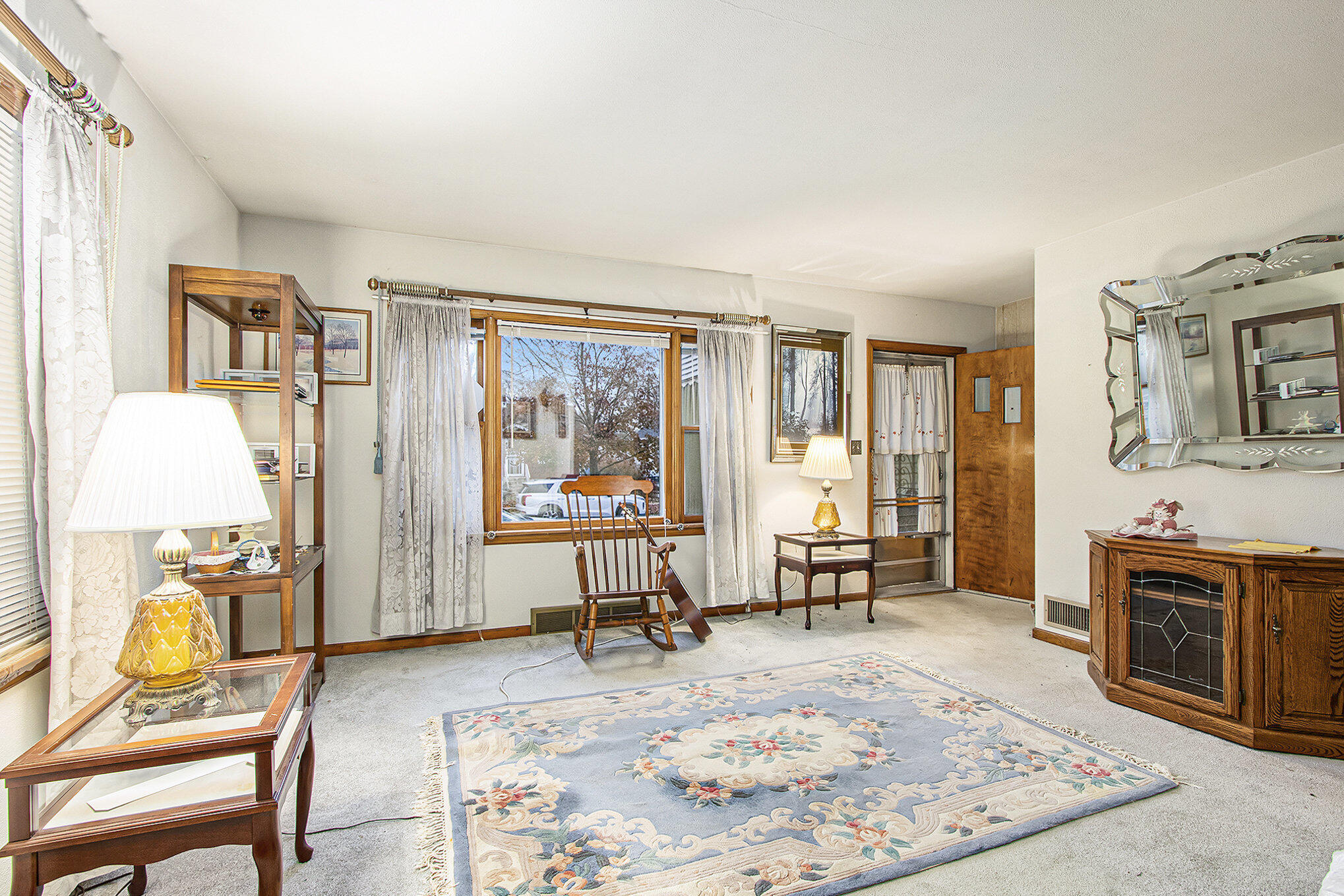 1027 Spruce Street Hammond, IN 46324 - Photo 4 of 17 a living room with furniture and a table