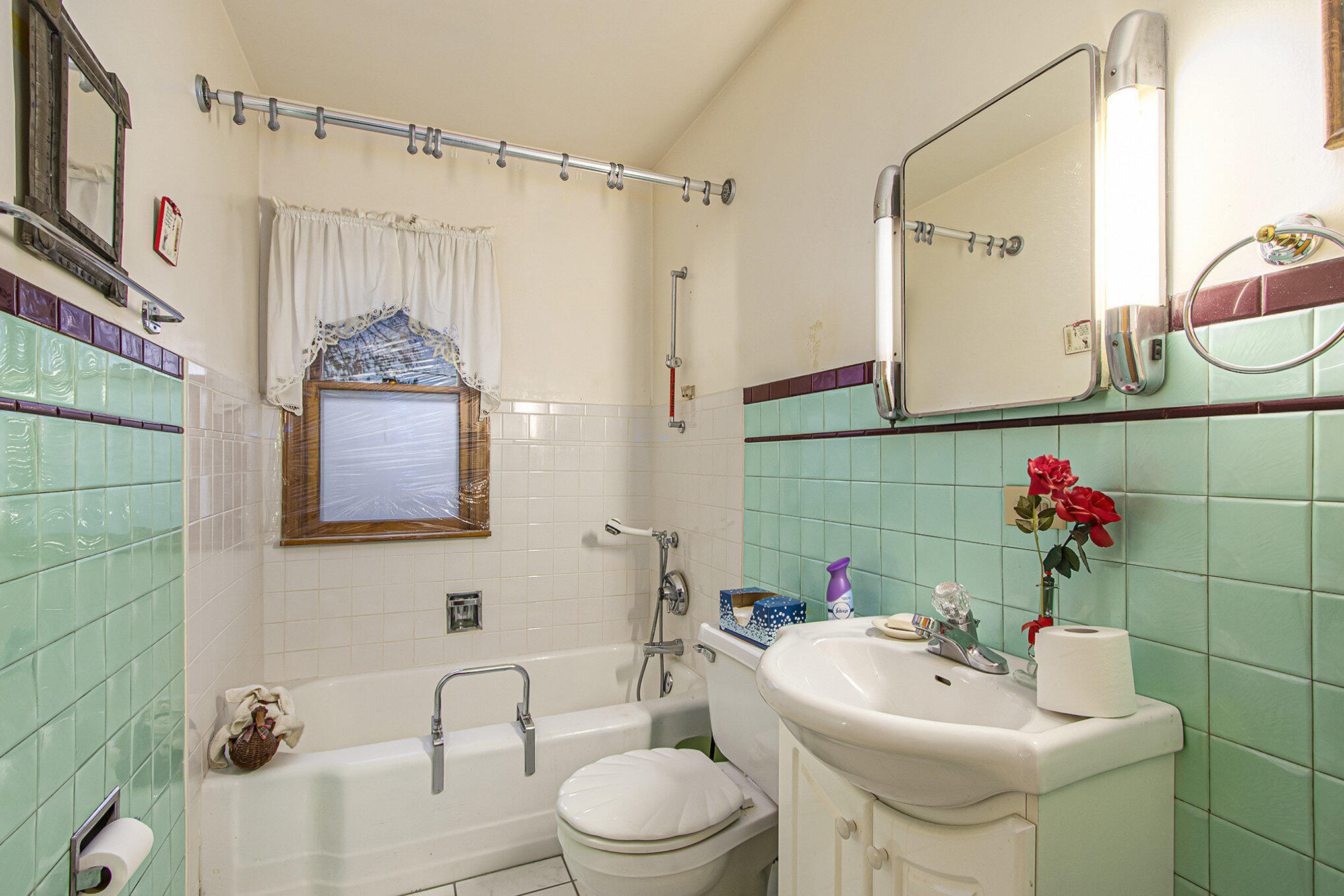 1027 Spruce Street Hammond, IN 46324 - Photo 10 of 17 a bathroom with a sink toilet and shower