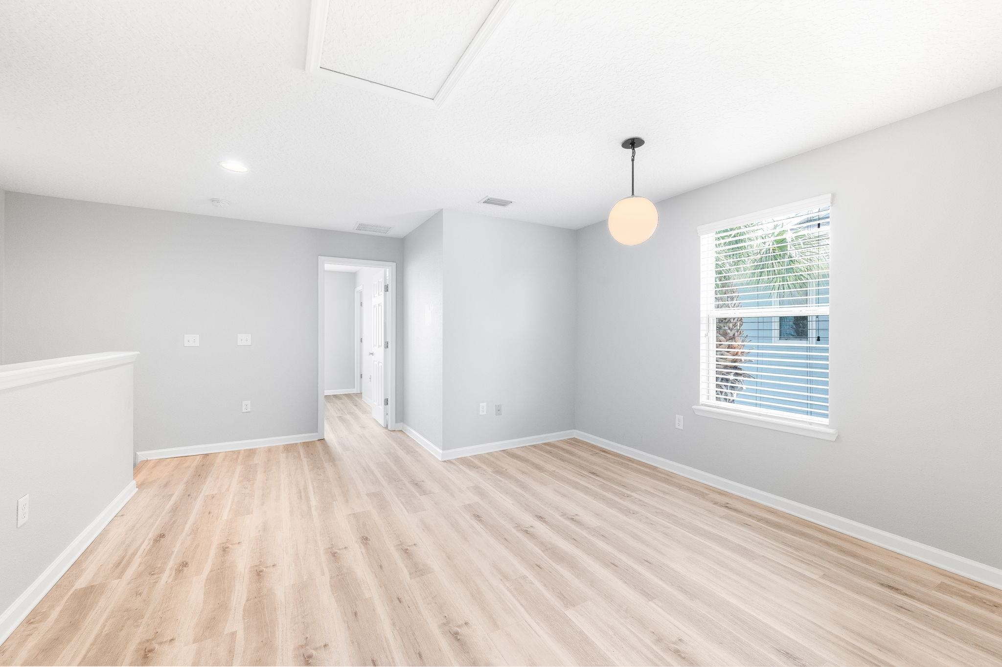 113 Islander Drive St. Augustine, FL 32080 - Photo 15 of 35 a view of an empty room with a window