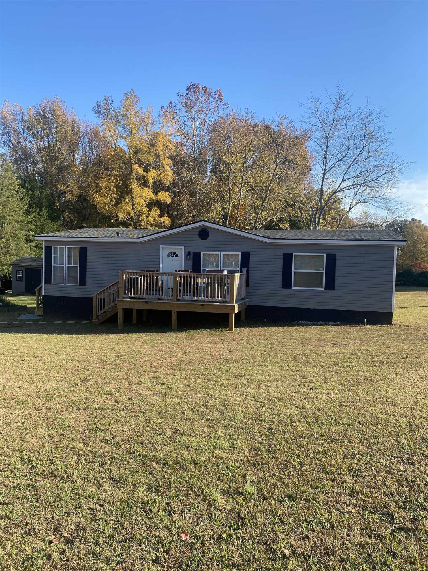1658 Jack Clement Road Stem, NC 27581 - Photo 1 of 8 a view of house with a garden