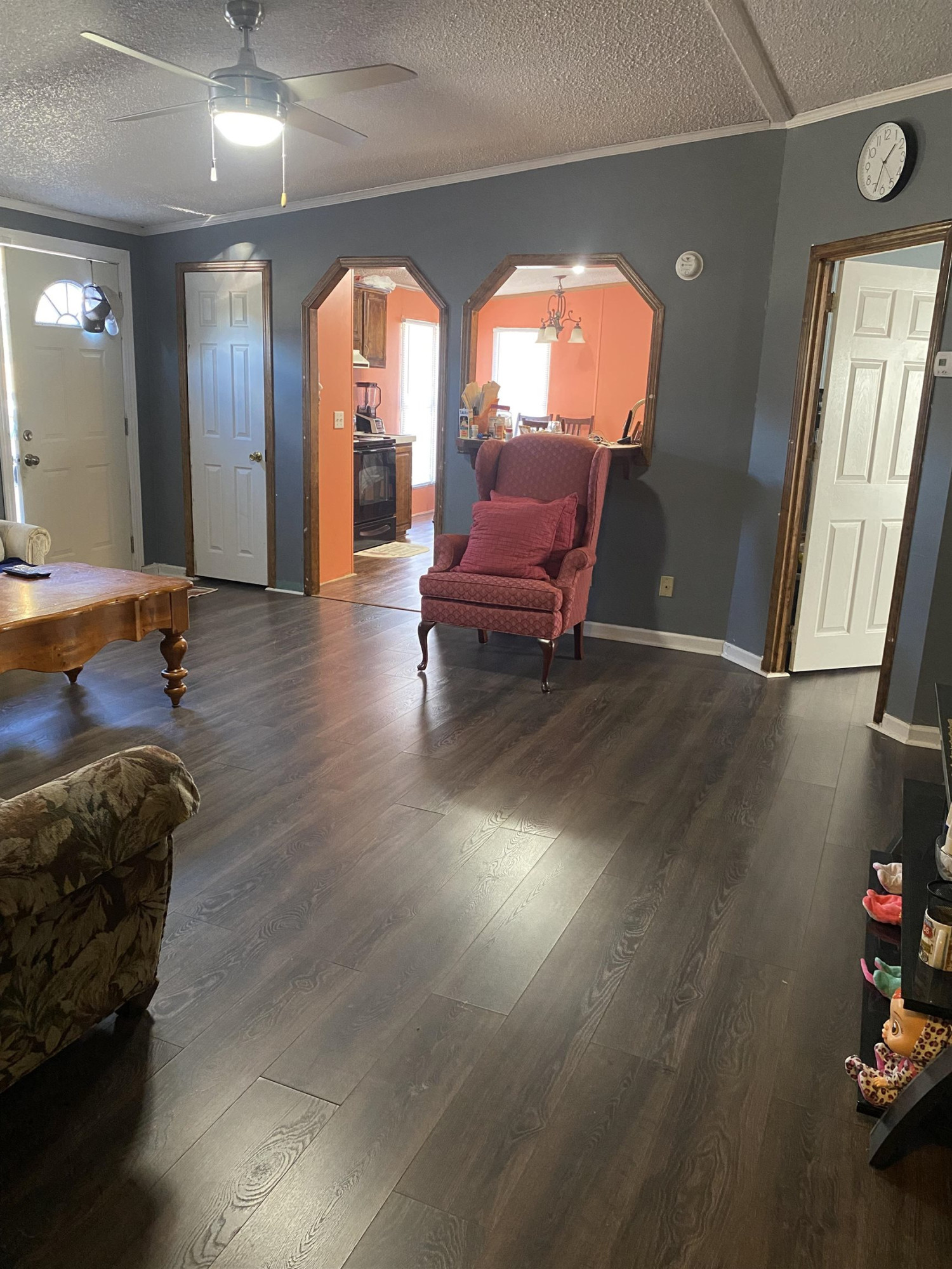 1658 Jack Clement Road Stem, NC 27581 - Photo 7 of 8 a living room with furniture and a large window