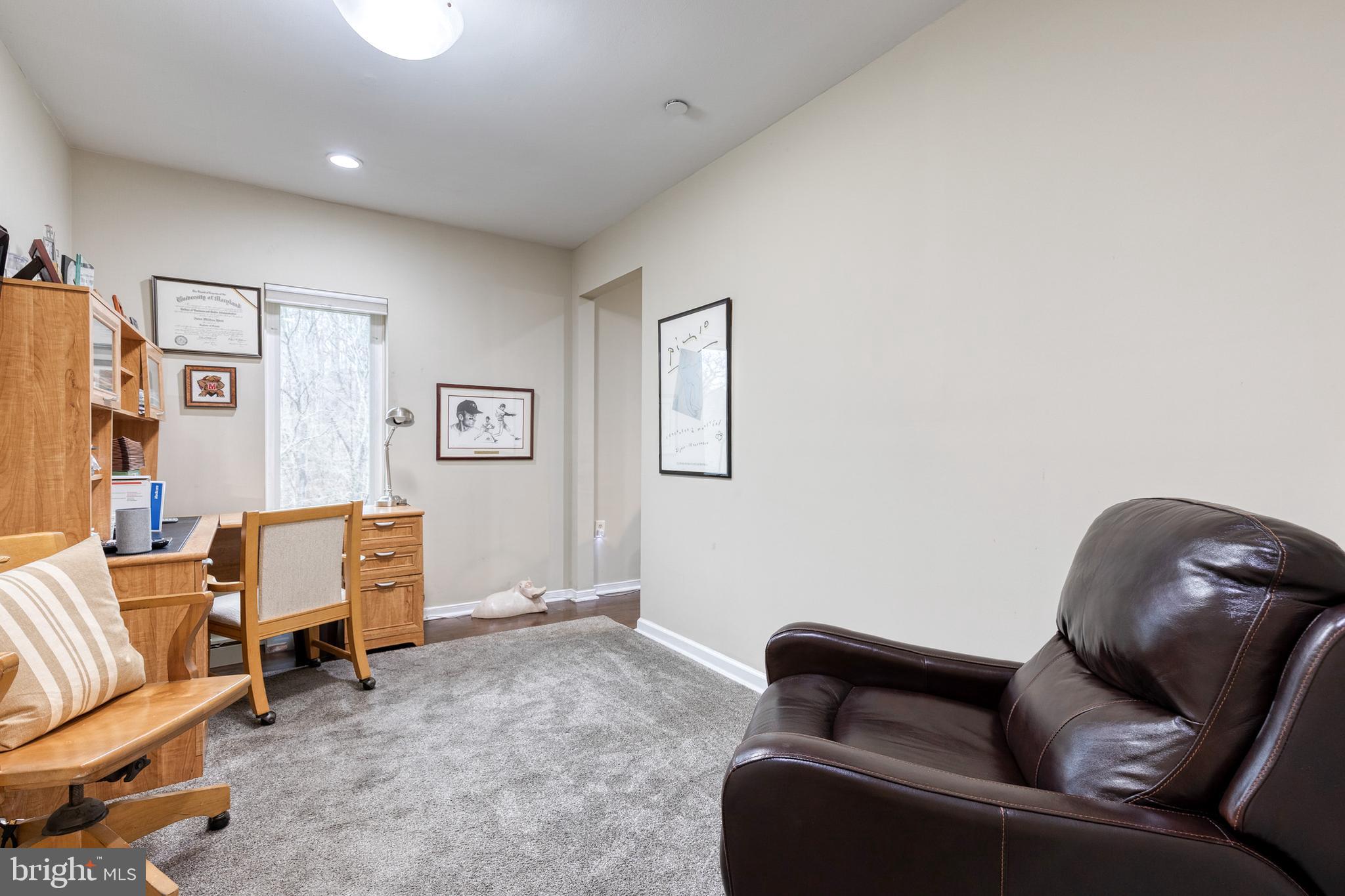 2331 Old Court Road, Unit 307 Baltimore, MD 21208 - Photo 15 of 35 a living room with furniture and a couch