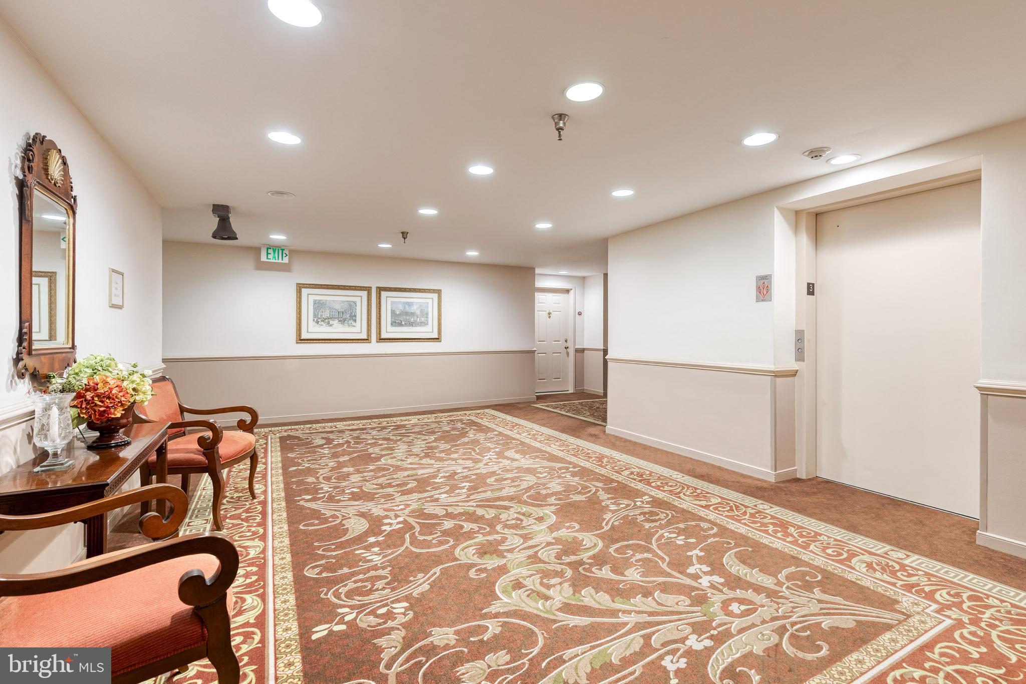 2331 Old Court Road, Unit 307 Baltimore, MD 21208 - Photo 23 of 35 a view of a livingroom with furniture and a rug