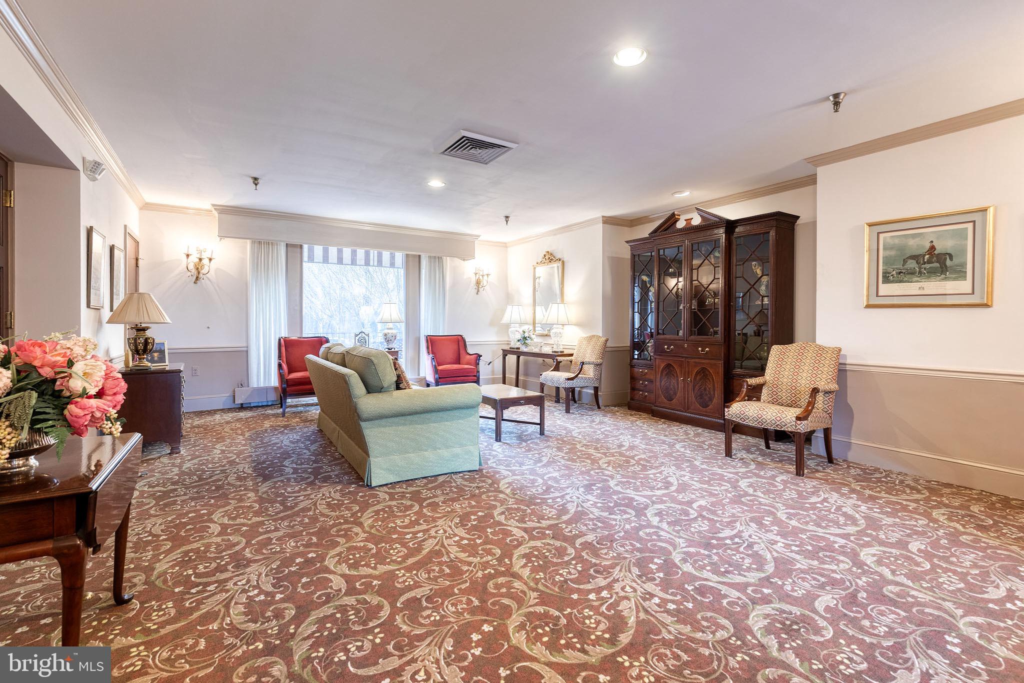 2331 Old Court Road, Unit 307 Baltimore, MD 21208 - Photo 26 of 35 a living room with furniture and a rug