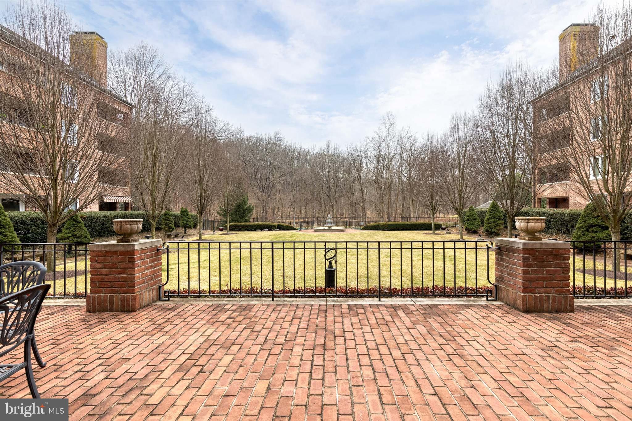 2331 Old Court Road, Unit 307 Baltimore, MD 21208 - Photo 27 of 35 a view of backyard with a barbeque and wooden fence