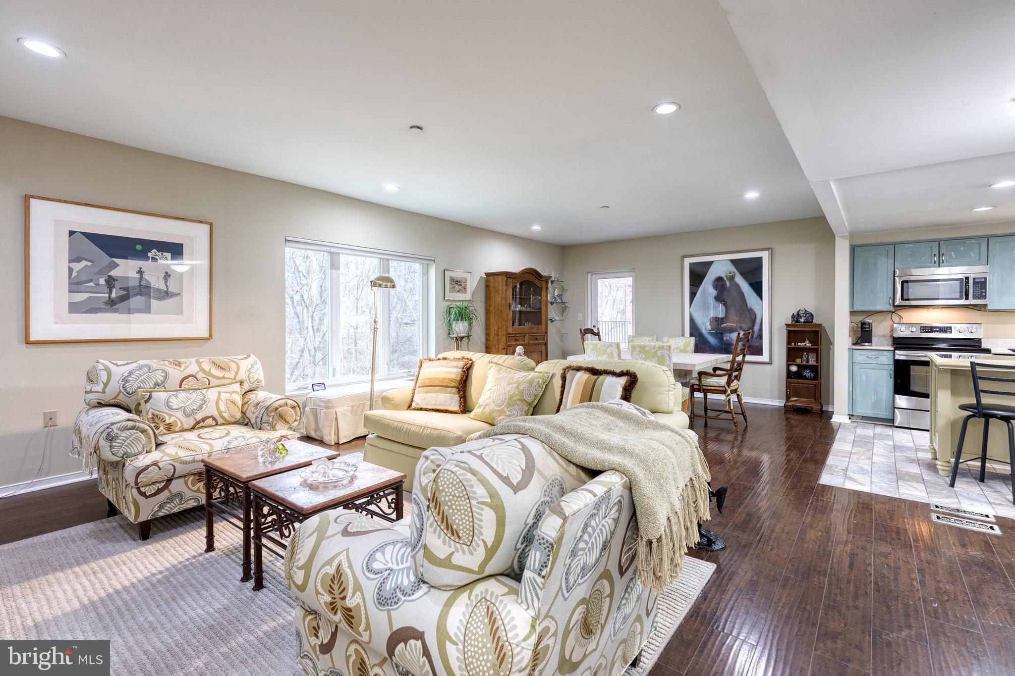 2331 Old Court Road, Unit 307 Baltimore, MD 21208 - Photo 4 of 35 a bed room with two bed and a chair