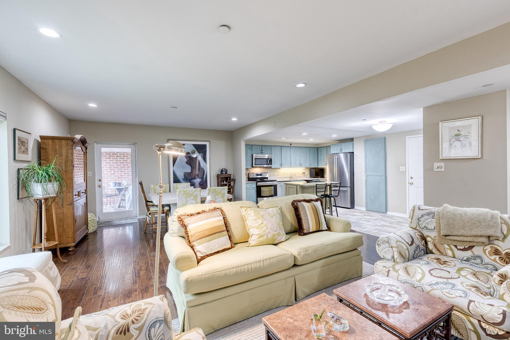 2331 Old Court Road, Unit 307 Baltimore, MD 21208 - Photo 5 of 35 a view of a living room kitchen and a wooden floor