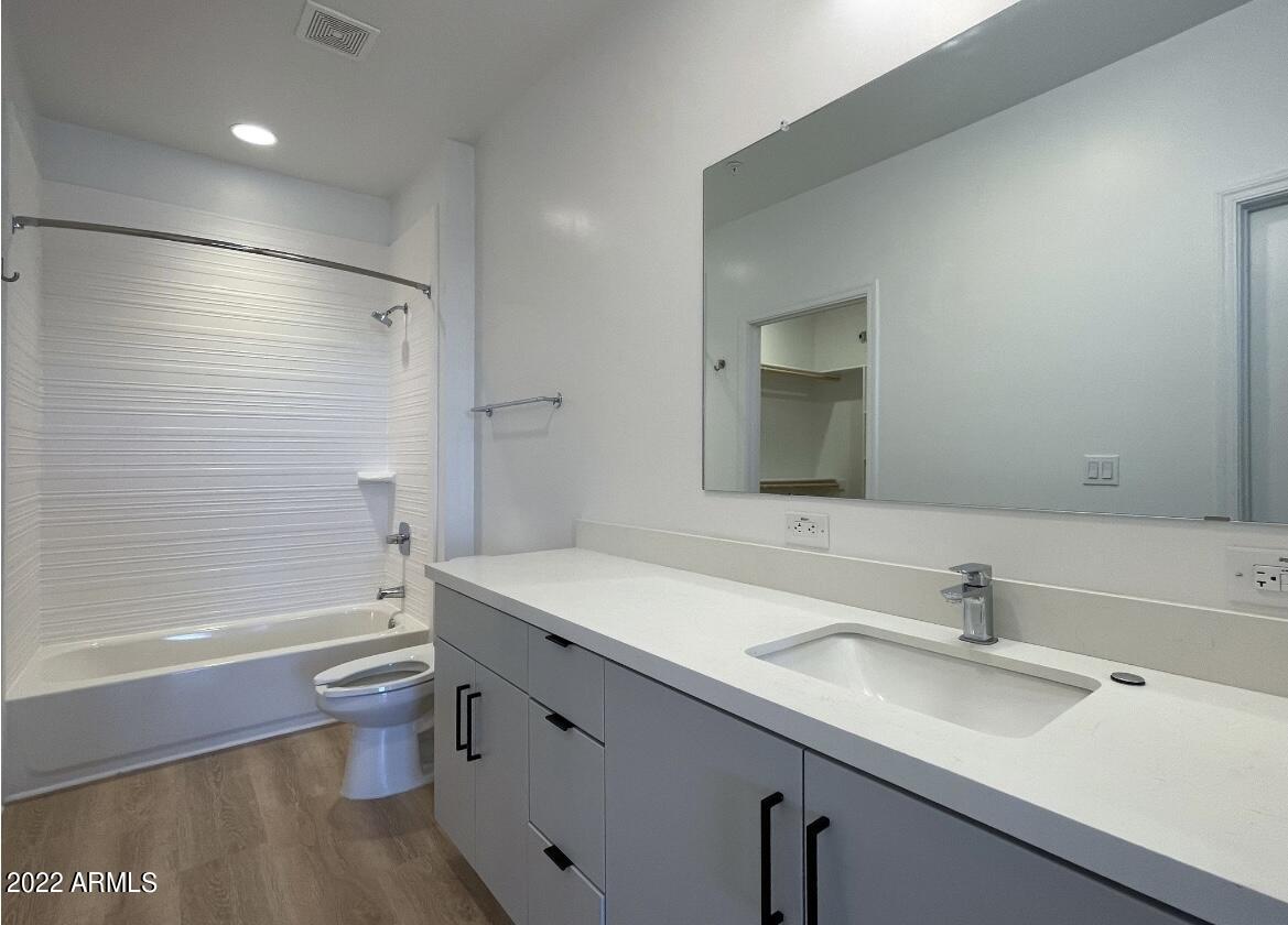 12412 North Saguaro Boulevard, Unit 303 Fountain Hills, AZ 85268 - Photo 31 of 48 a bathroom with a sink a toilet and shower