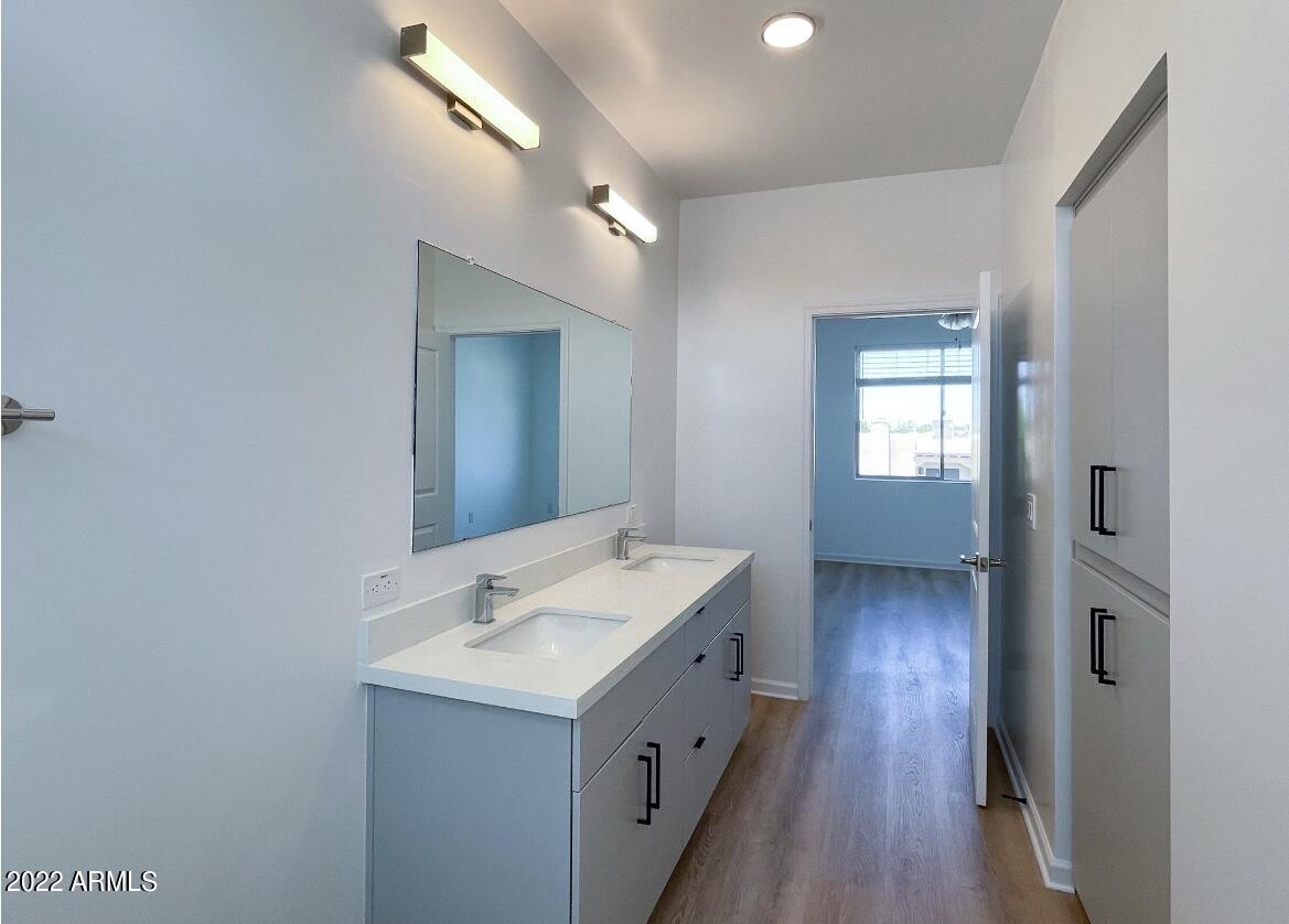 12412 North Saguaro Boulevard, Unit 303 Fountain Hills, AZ 85268 - Photo 42 of 48 a bathroom with a sink and a mirror