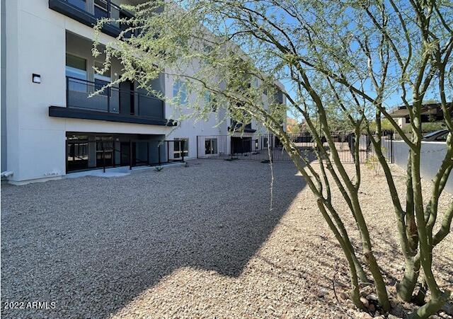 12412 North Saguaro Boulevard, Unit 303 Fountain Hills, AZ 85268 - Photo 6 of 48 a view of a house with a snow on the road