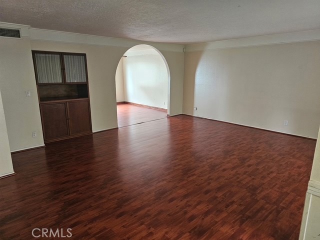 7754 Vía Rosa Maria Burbank, CA 91504 - Photo 4 of 13 a view of empty room with wooden floor