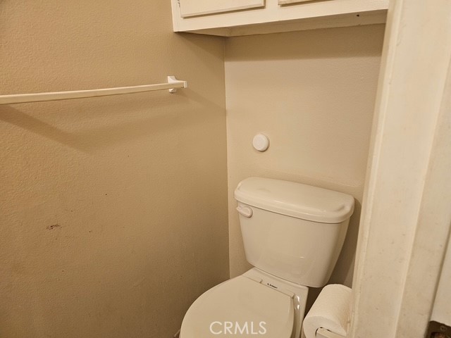 7754 Vía Rosa Maria Burbank, CA 91504 - Photo 8 of 13 a white toilet sitting next to a shower