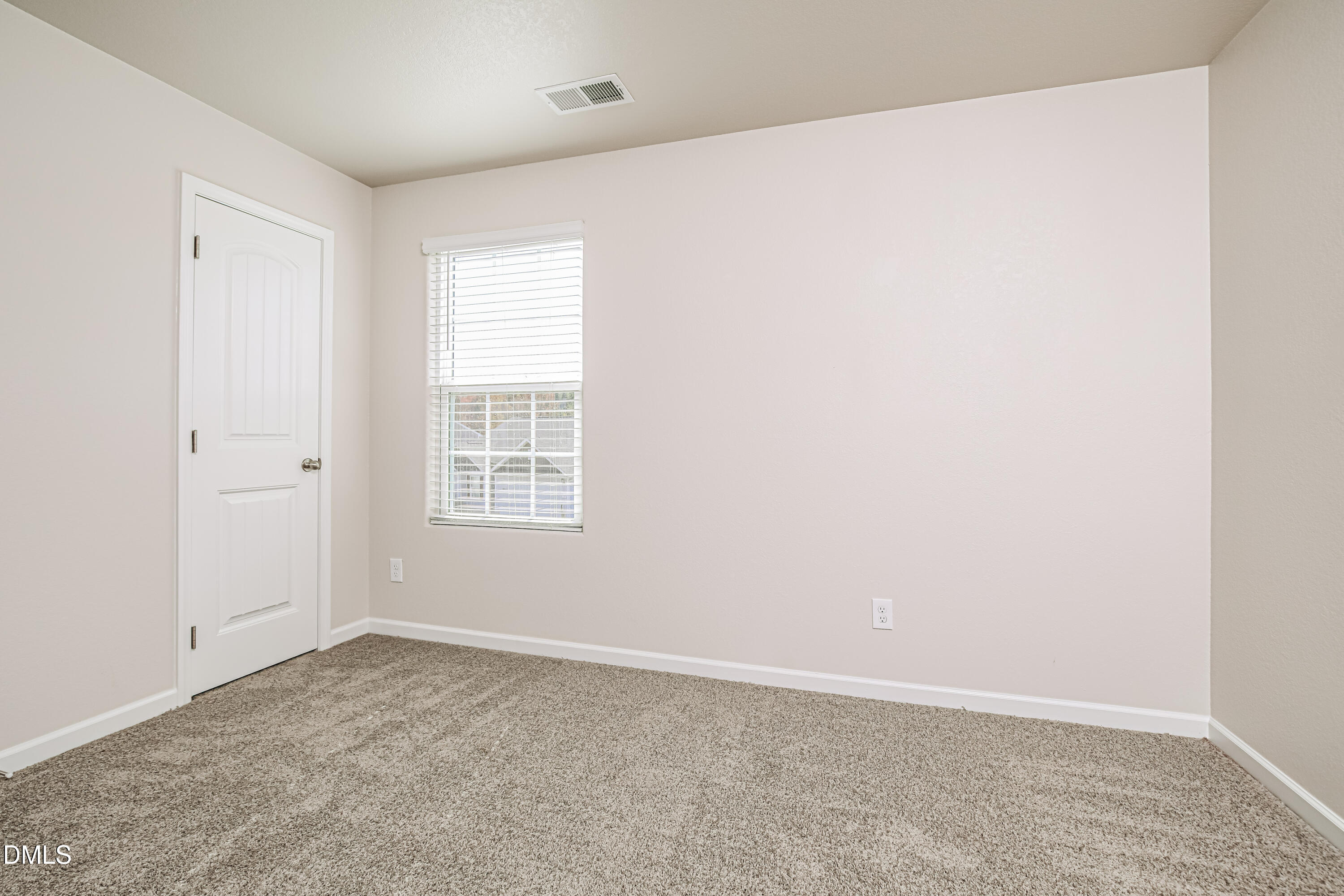 135 Shallow Drive Youngsville, NC 27596 - Photo 11 of 17 an empty room with a window