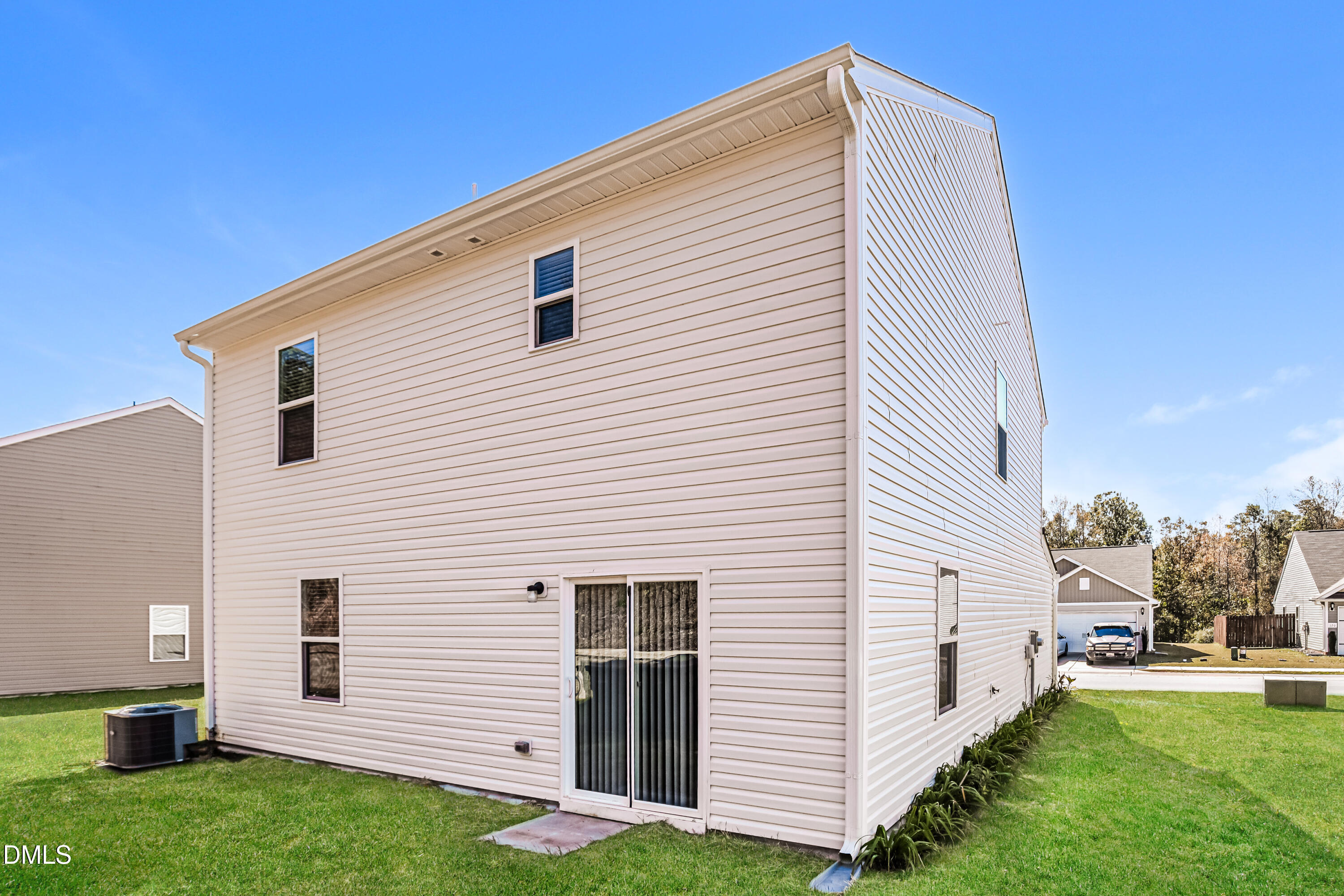 135 Shallow Drive Youngsville, NC 27596 - Photo 15 of 17 a view of a back yard of the house