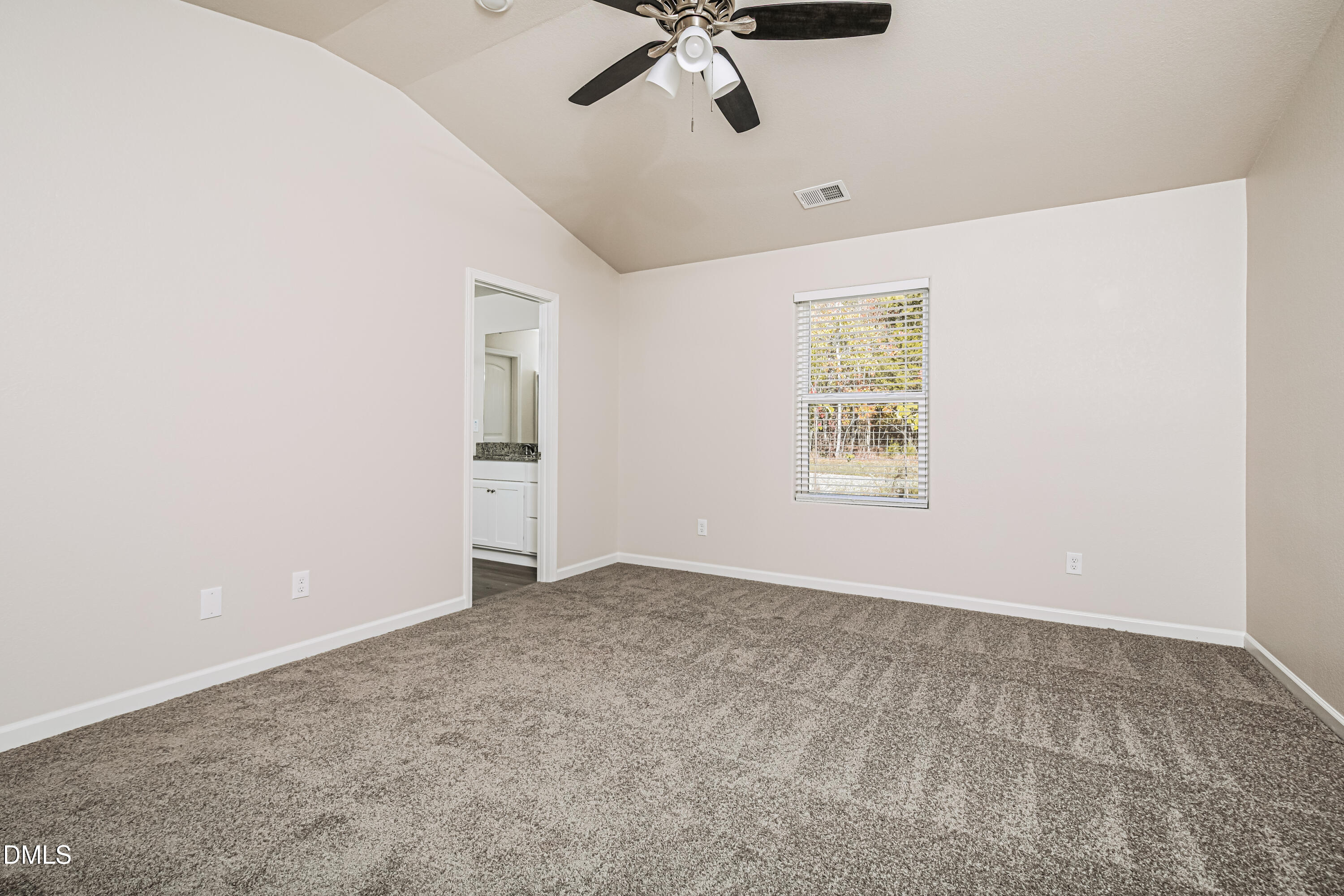 135 Shallow Drive Youngsville, NC 27596 - Photo 7 of 17 an empty room with fan and windows