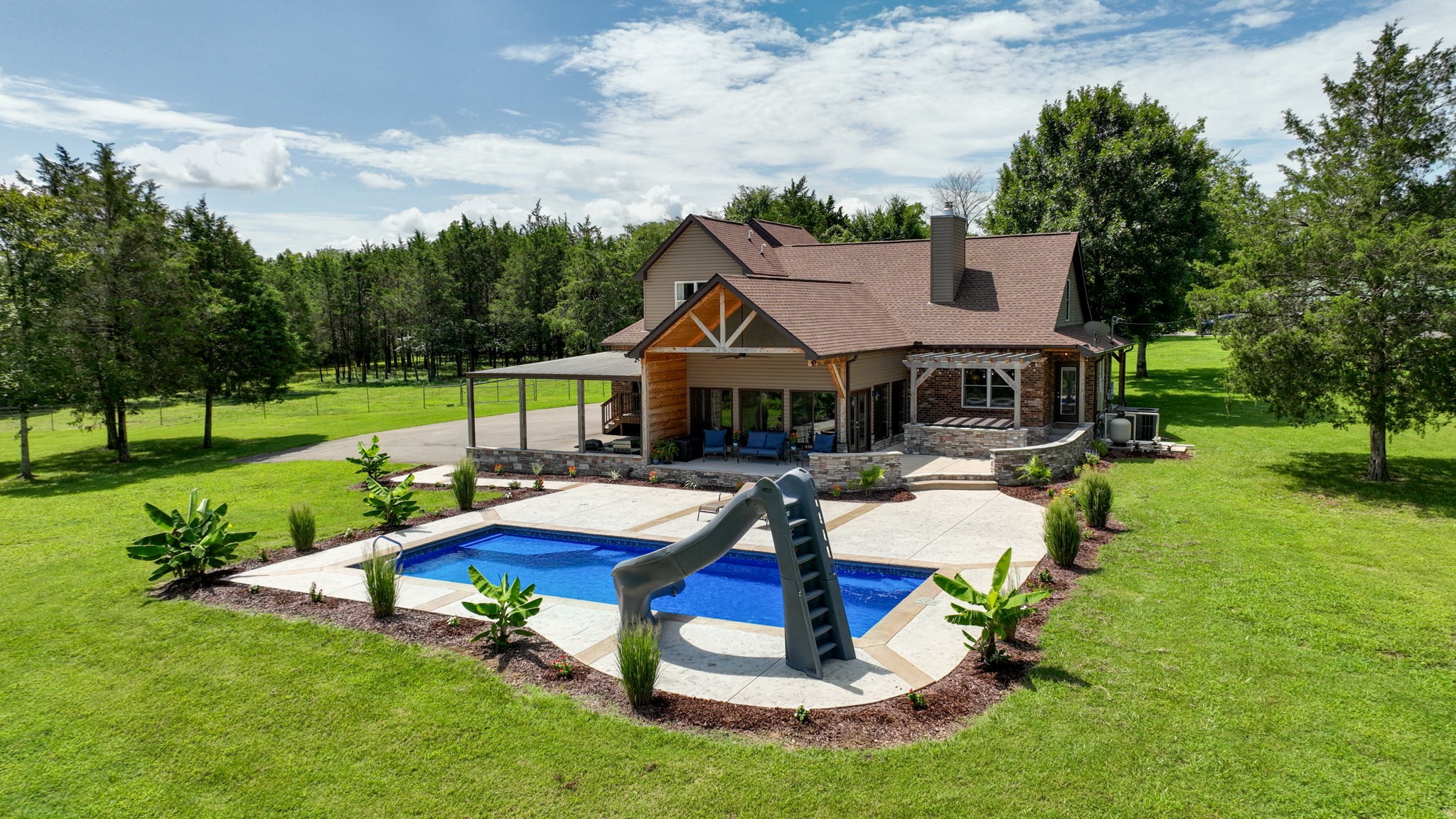 a house with garden in front of it
