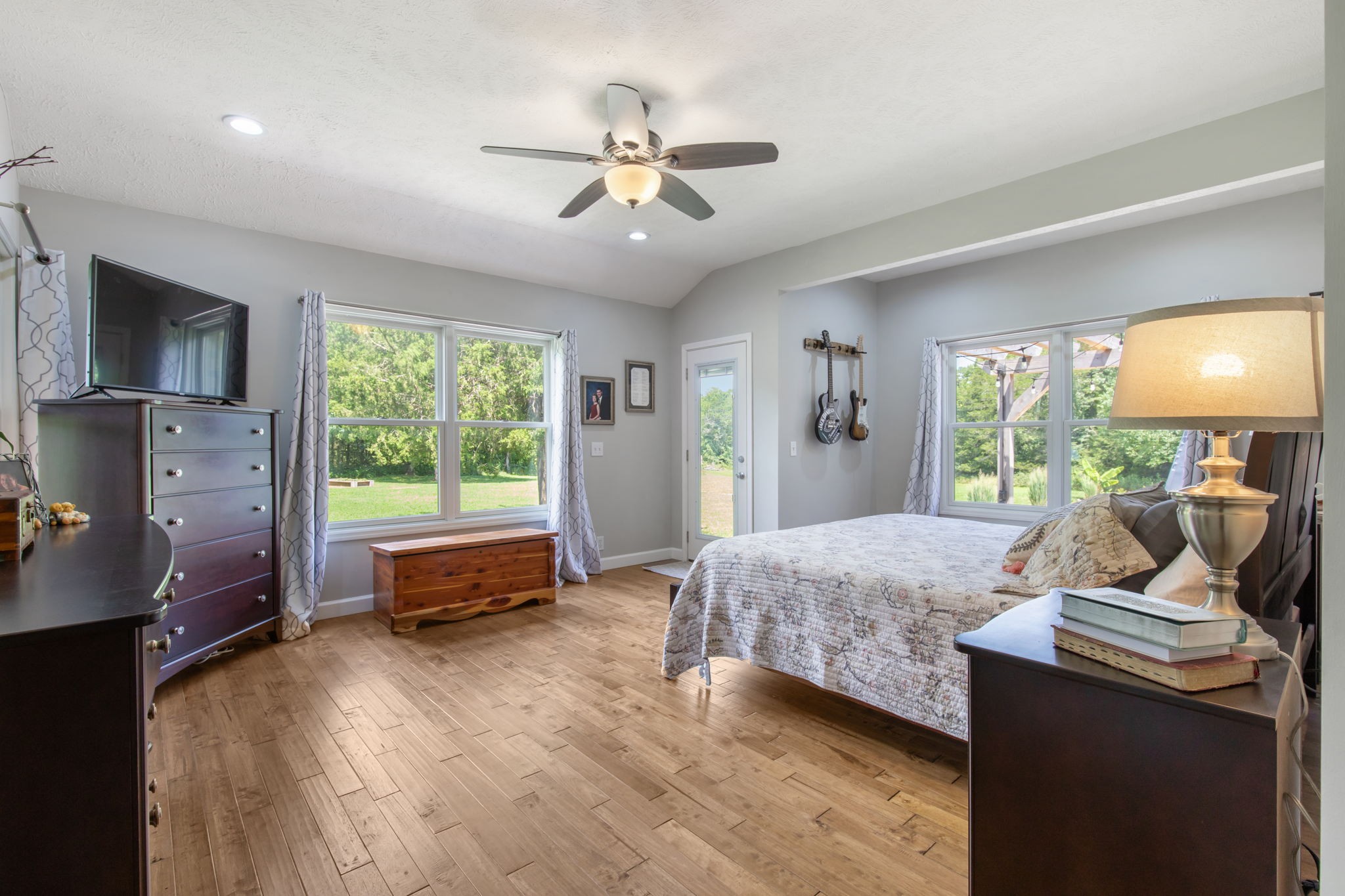 3161 Little Rock Road Eagleville, TN 37060 - Photo 15 of 56 a bedroom with a bed and large windows
