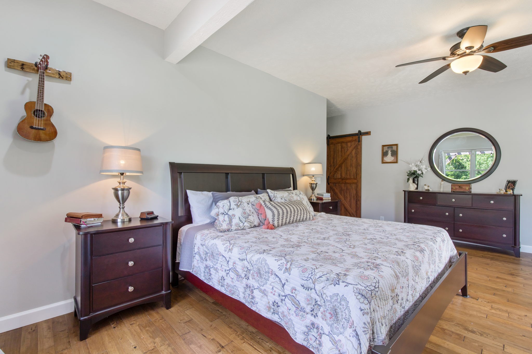 3161 Little Rock Road Eagleville, TN 37060 - Photo 16 of 56 a bedroom with a bed and a chandelier