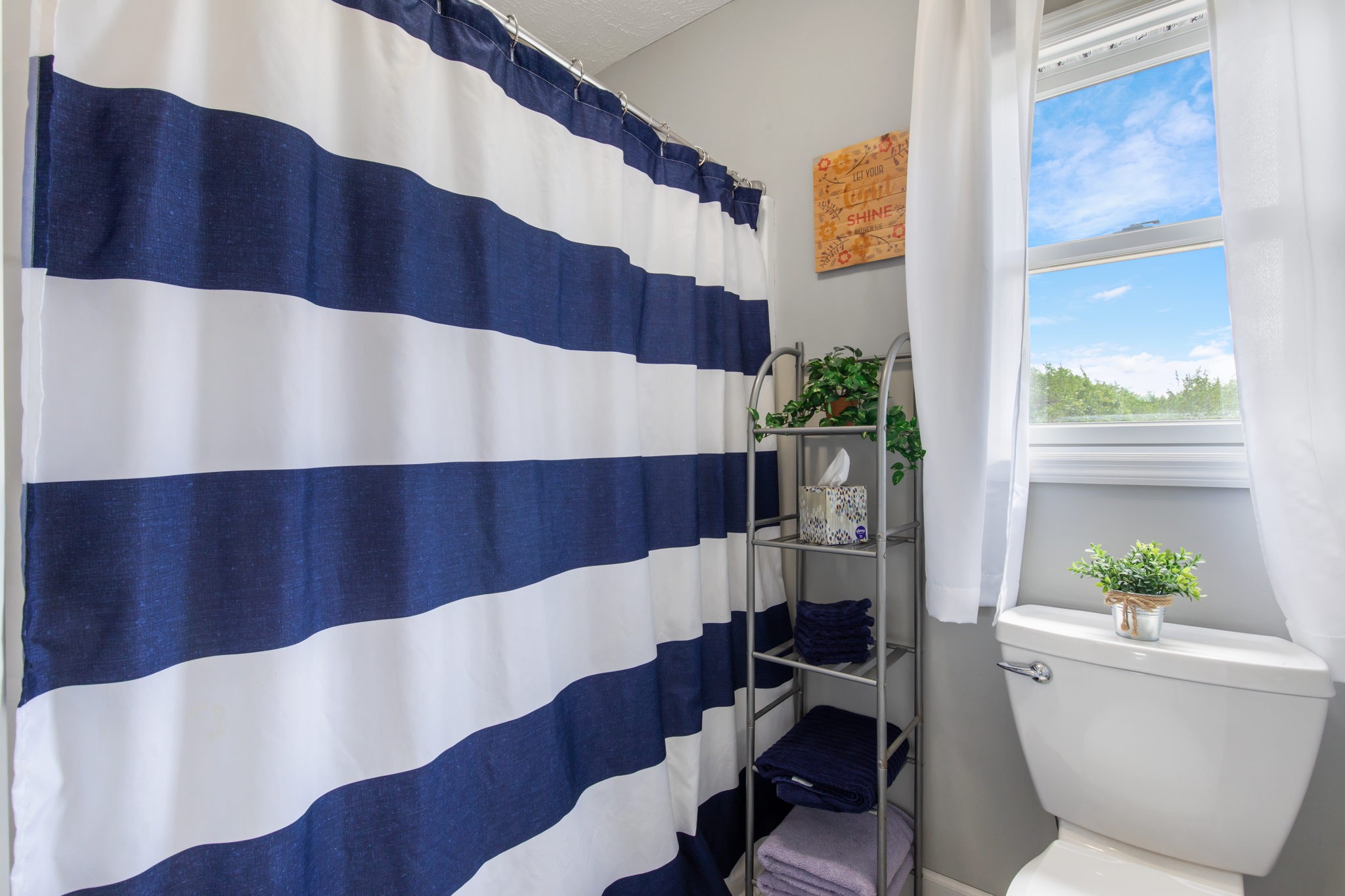 3161 Little Rock Road Eagleville, TN 37060 - Photo 27 of 56 a living room with furniture and a potted plant