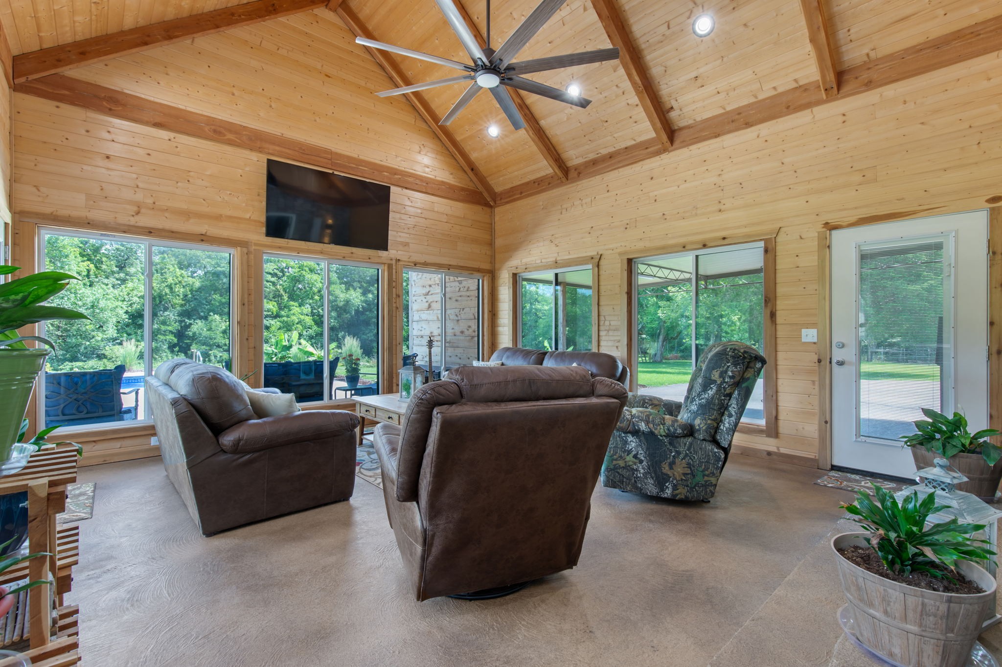 3161 Little Rock Road Eagleville, TN 37060 - Photo 30 of 56 a living room with furniture and floor to ceiling windows