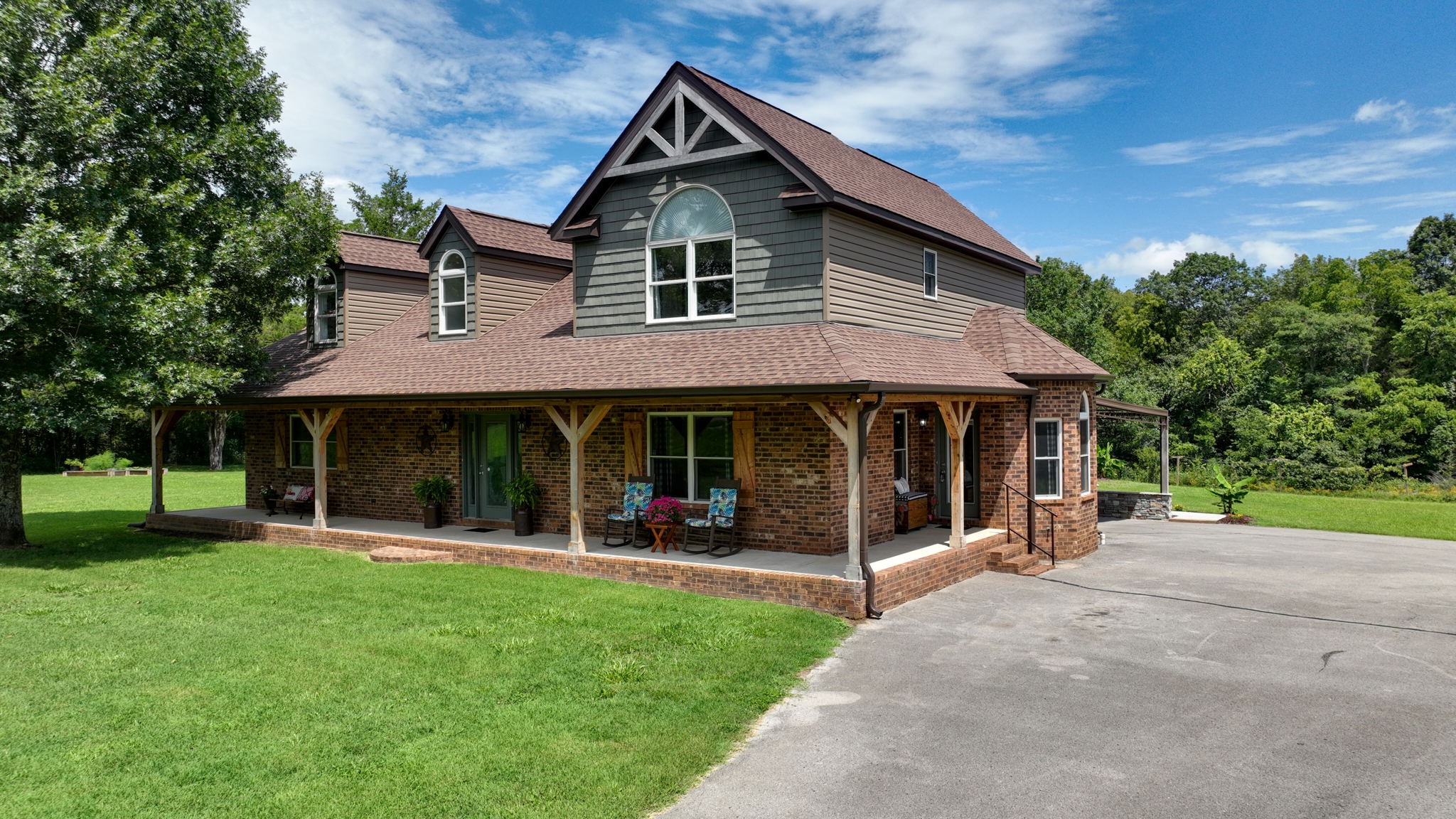 3161 Little Rock Road Eagleville, TN 37060 - Photo 3 of 56 a view of a house with a yard and garden