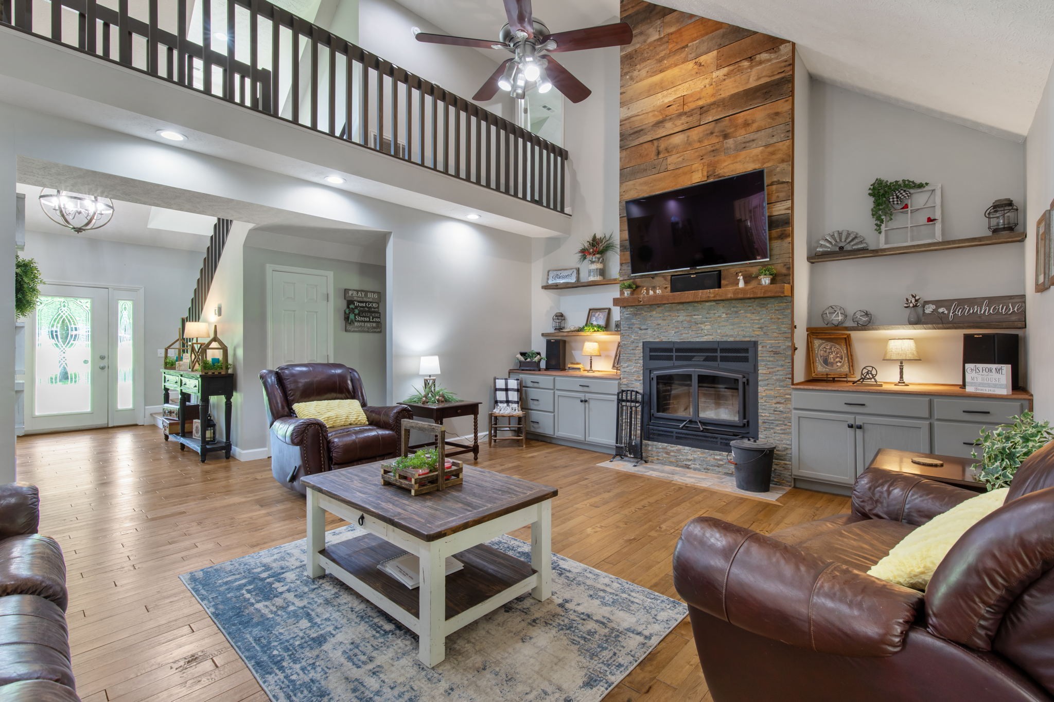 3161 Little Rock Road Eagleville, TN 37060 - Photo 5 of 56 a living room with furniture a flat screen tv and a fireplace