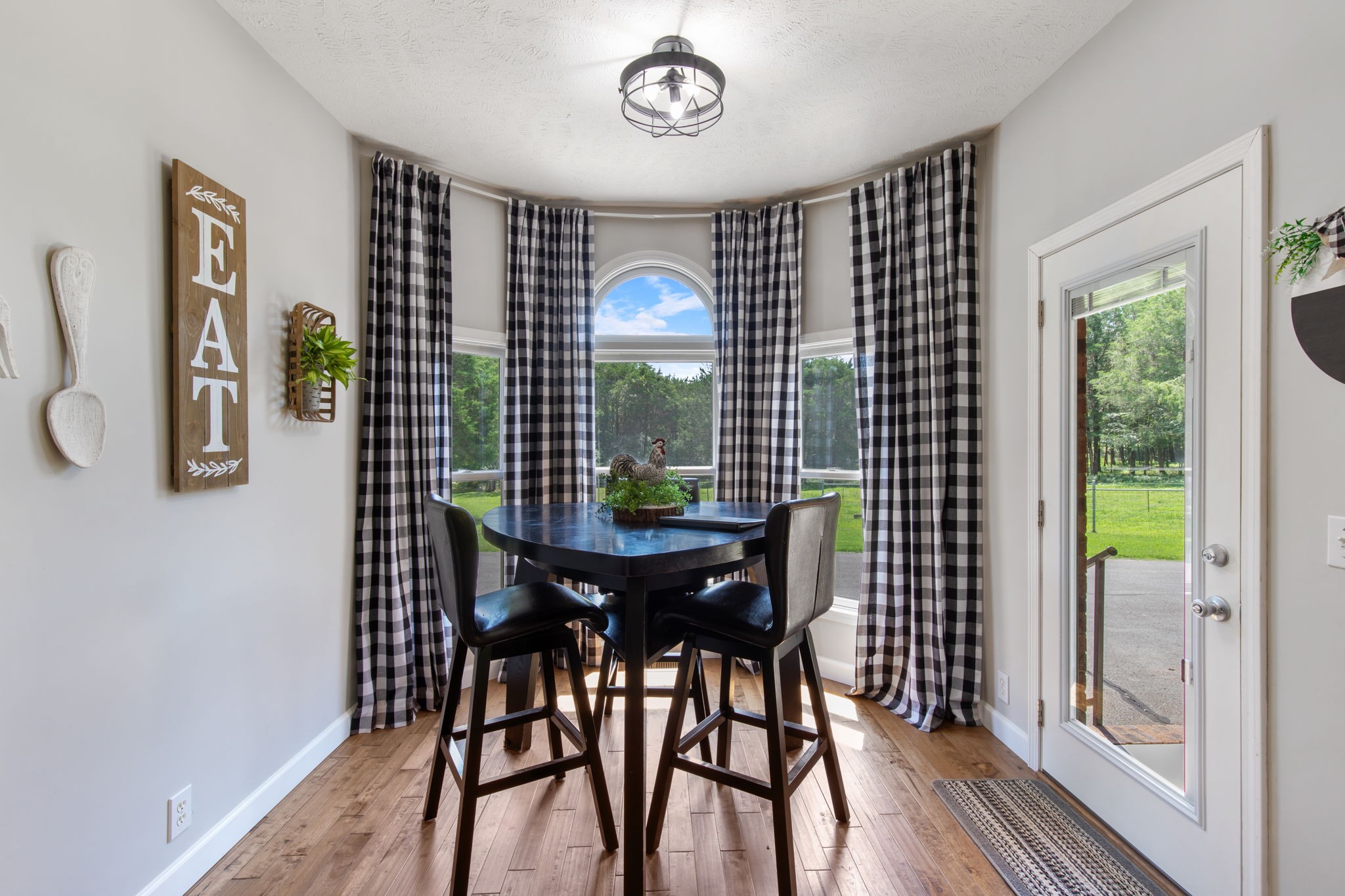 3161 Little Rock Road Eagleville, TN 37060 - Photo 8 of 56 a view of a dining room with furniture window and wooden floor