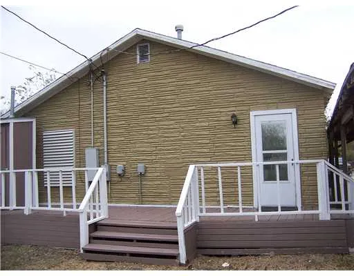 a front view of a house with stairs
