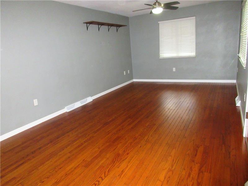Additional view of living room/dining room combo.