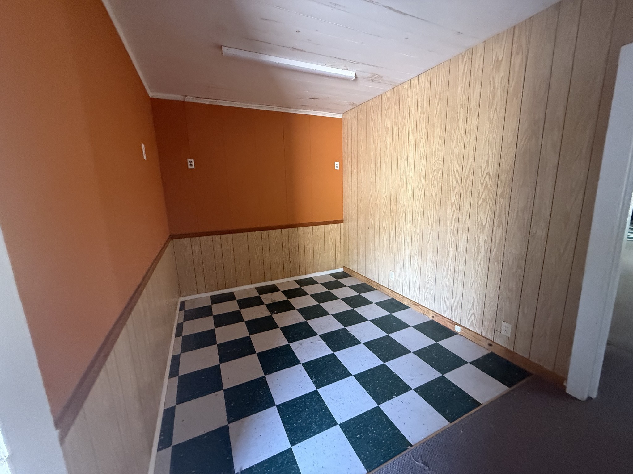 4870 East Main Street Erin, TN 37061 - Photo 11 of 12 a black and white checkered floor with a black white checkered floor