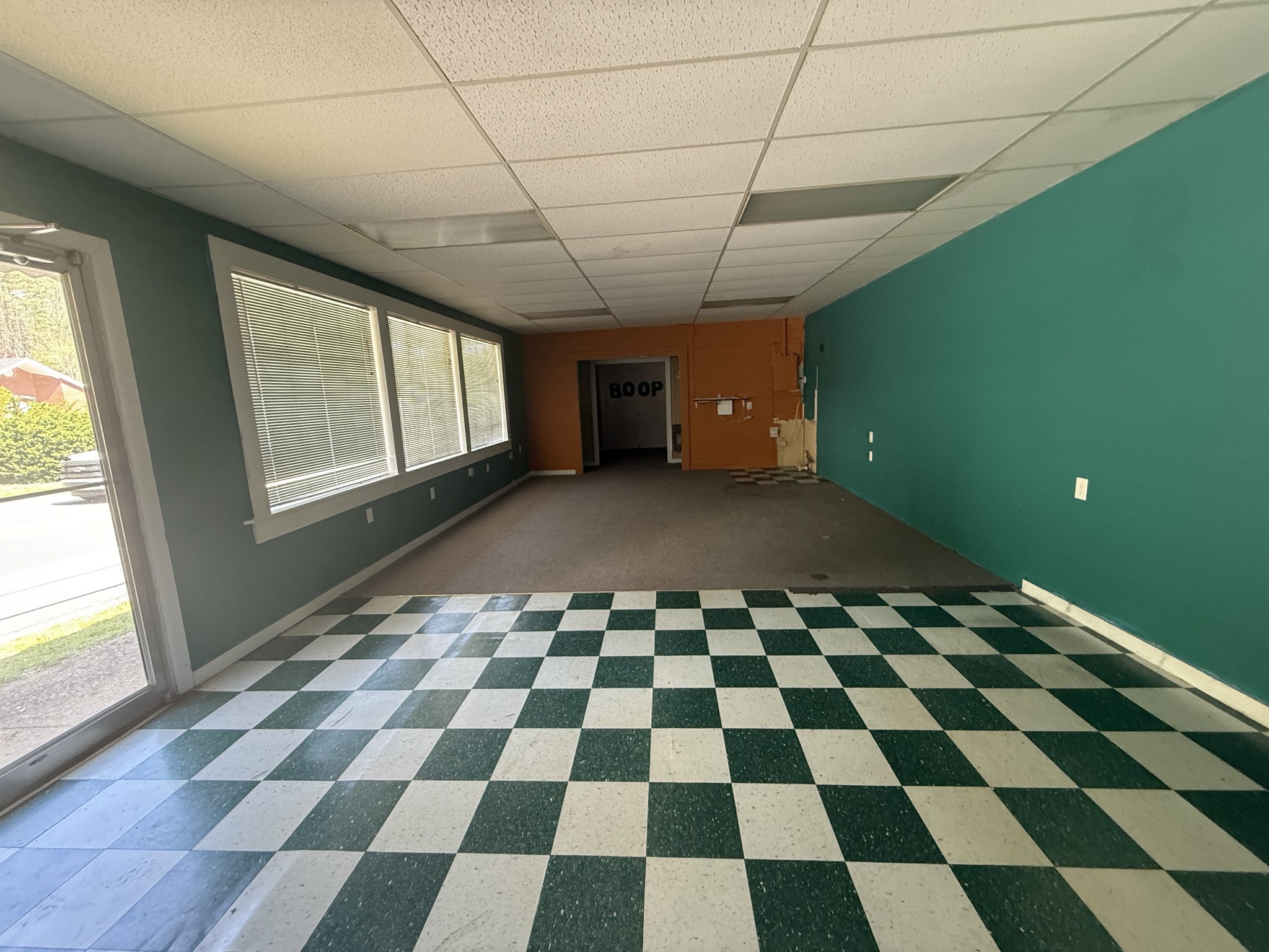 4870 East Main Street Erin, TN 37061 - Photo 9 of 12 a black and white checkered floor