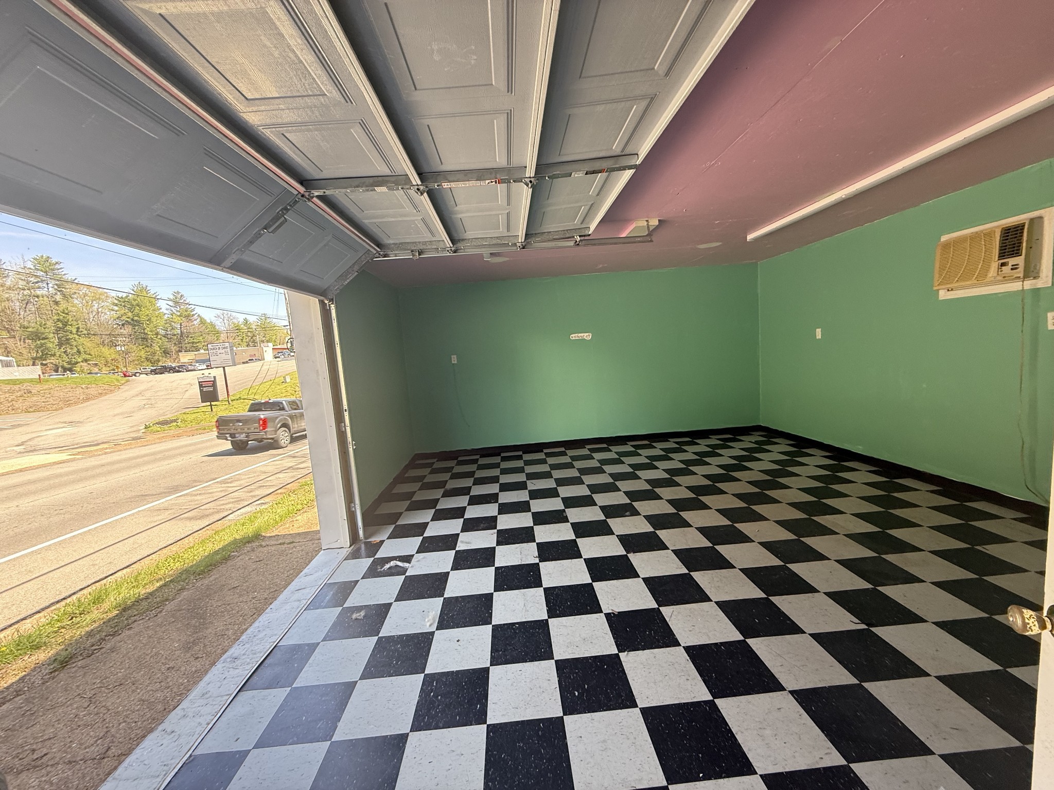 4870 East Main Street Erin, TN 37061 - Photo 10 of 12 a black and white checkered floor