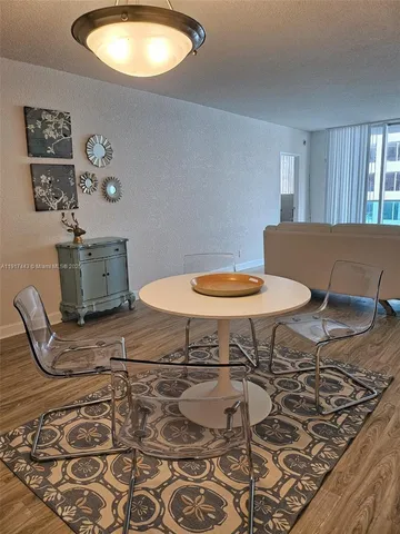 a living room with a couch and a table