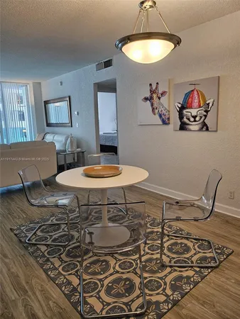 a living room with a couch and a table