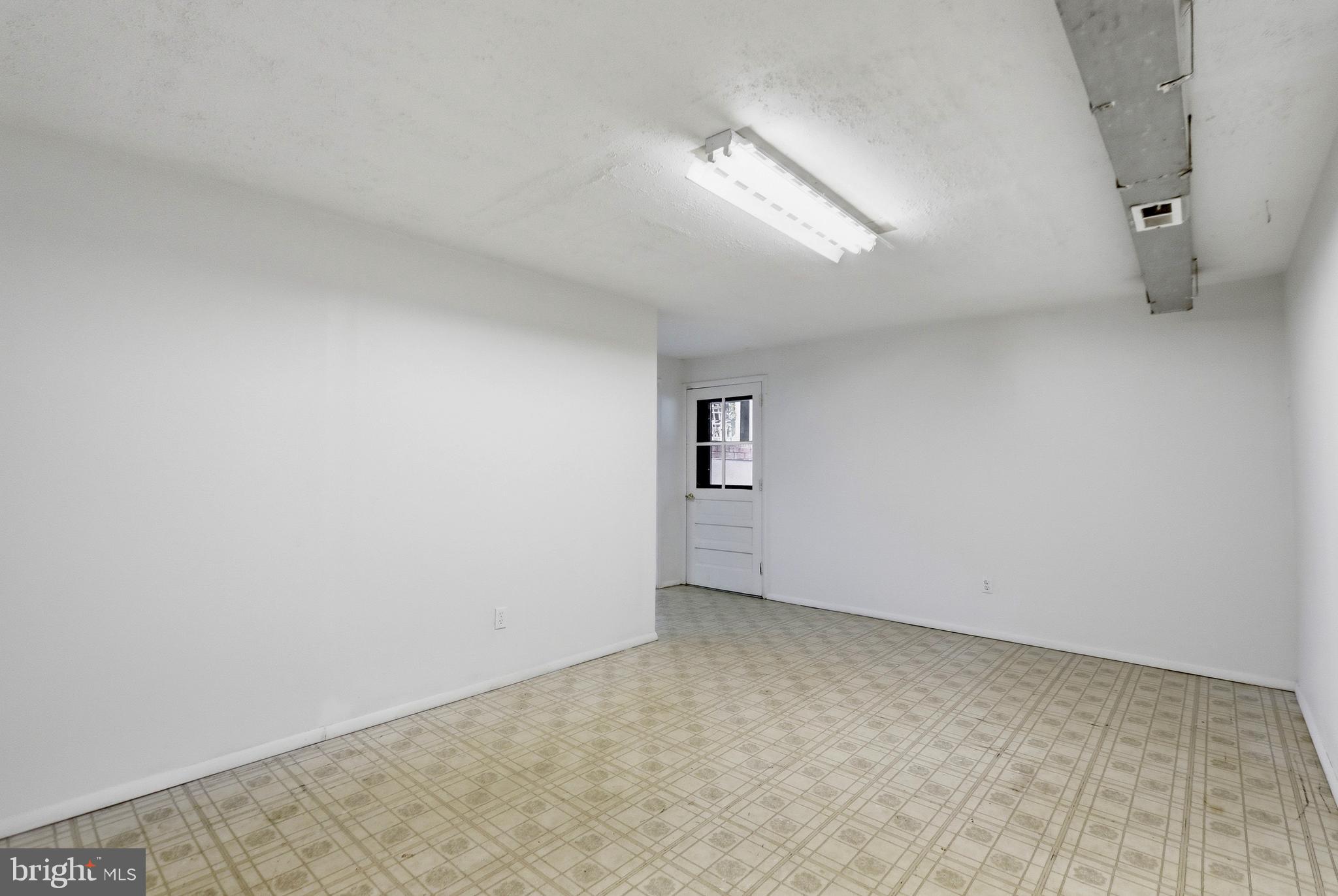 9787 Lees Mill Road Warrenton, VA 20186 - Photo 24 of 35 Finished basement space with walk-up door