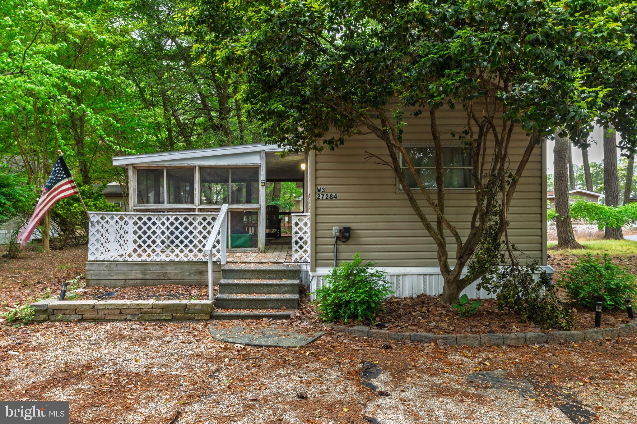 27284 Cottage Road, Unit 9182 Millsboro, DE 19966 - Photo 2 of 18 a view of a house with a yard
