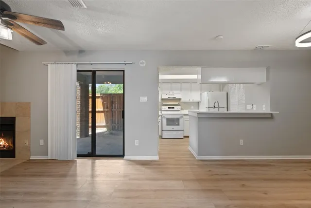 a view of kitchen with wooden floor